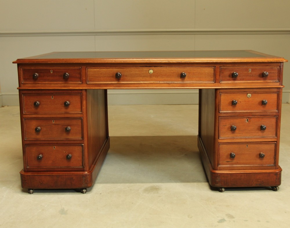 A Large Victorian mahogany twin pedestal desk. View II