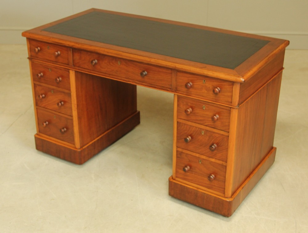 A VICTORIAN WALNUT TWIN PEDISTAL WRITING DESK. View V
