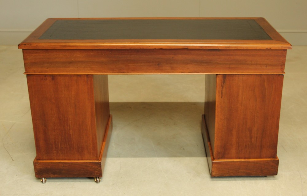 A VICTORIAN WALNUT TWIN PEDISTAL WRITING DESK. View IX