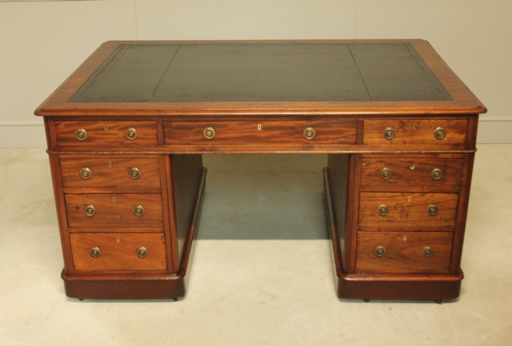 A Victorian mahogany partners desk