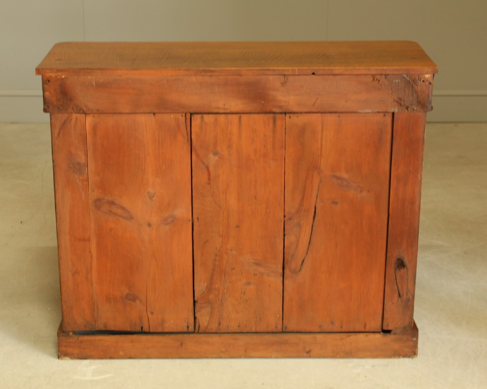 A Victorian walnut two door sideboard. View IX