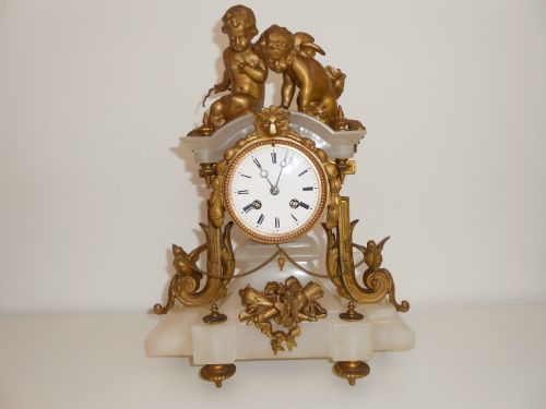 French Alabaster and Gilt Metal Mantle Clock