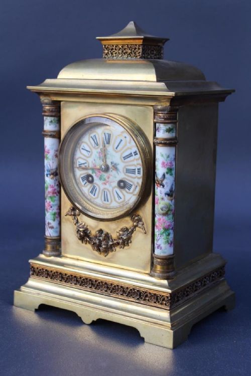 fig 1. 19th Century French Mantle Clock With Porcelain Columns & Dial
