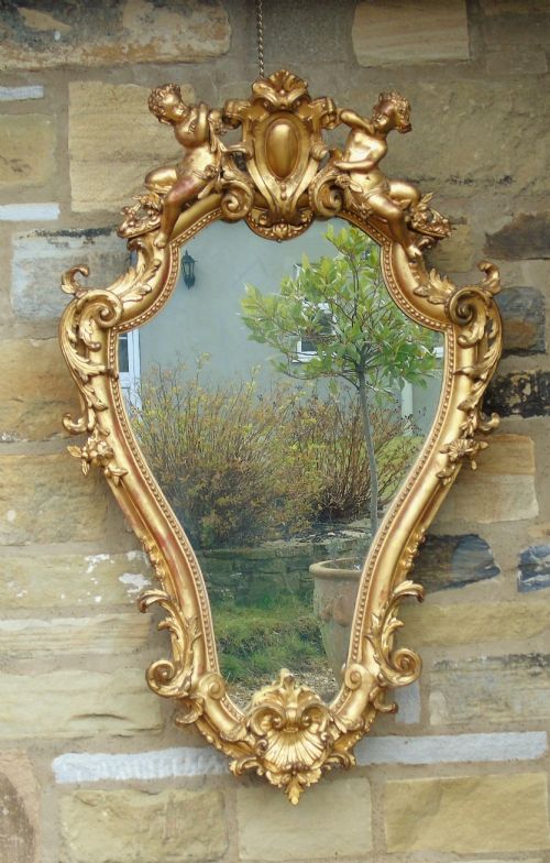 Good 19th Century Italian Gilt Cherub Mirror of Cartouche Form