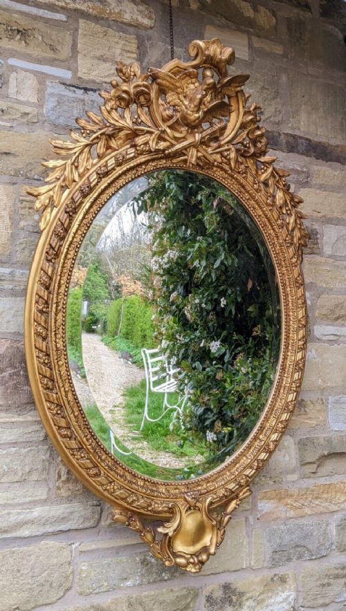 fig 1. Impressive French Oval Gilt Mirror Bird Crest