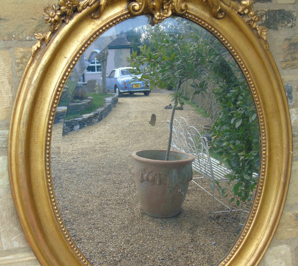Large Antique French Oval Giltwood and Gesso Mirror View II