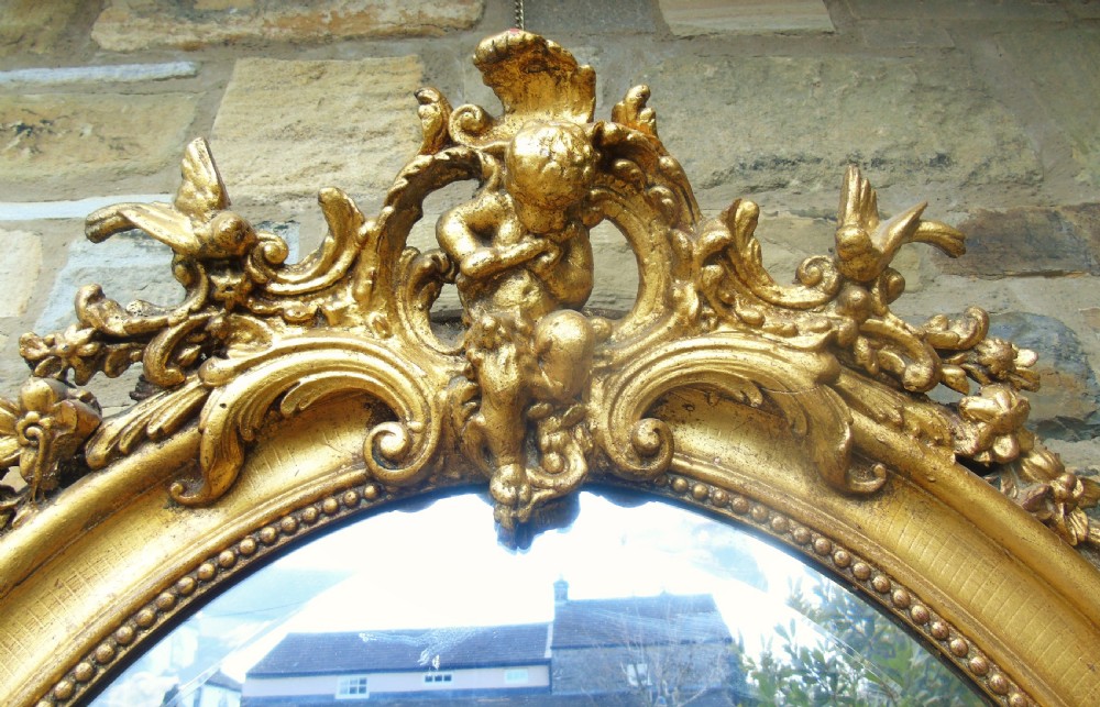 Large Antique French Oval Giltwood and Gesso Mirror View V