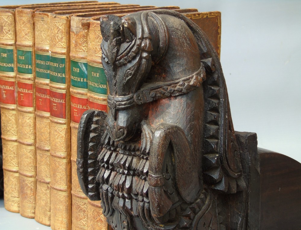 Good Pair of 18th Century Indian Carved Horse Head Bookends View II