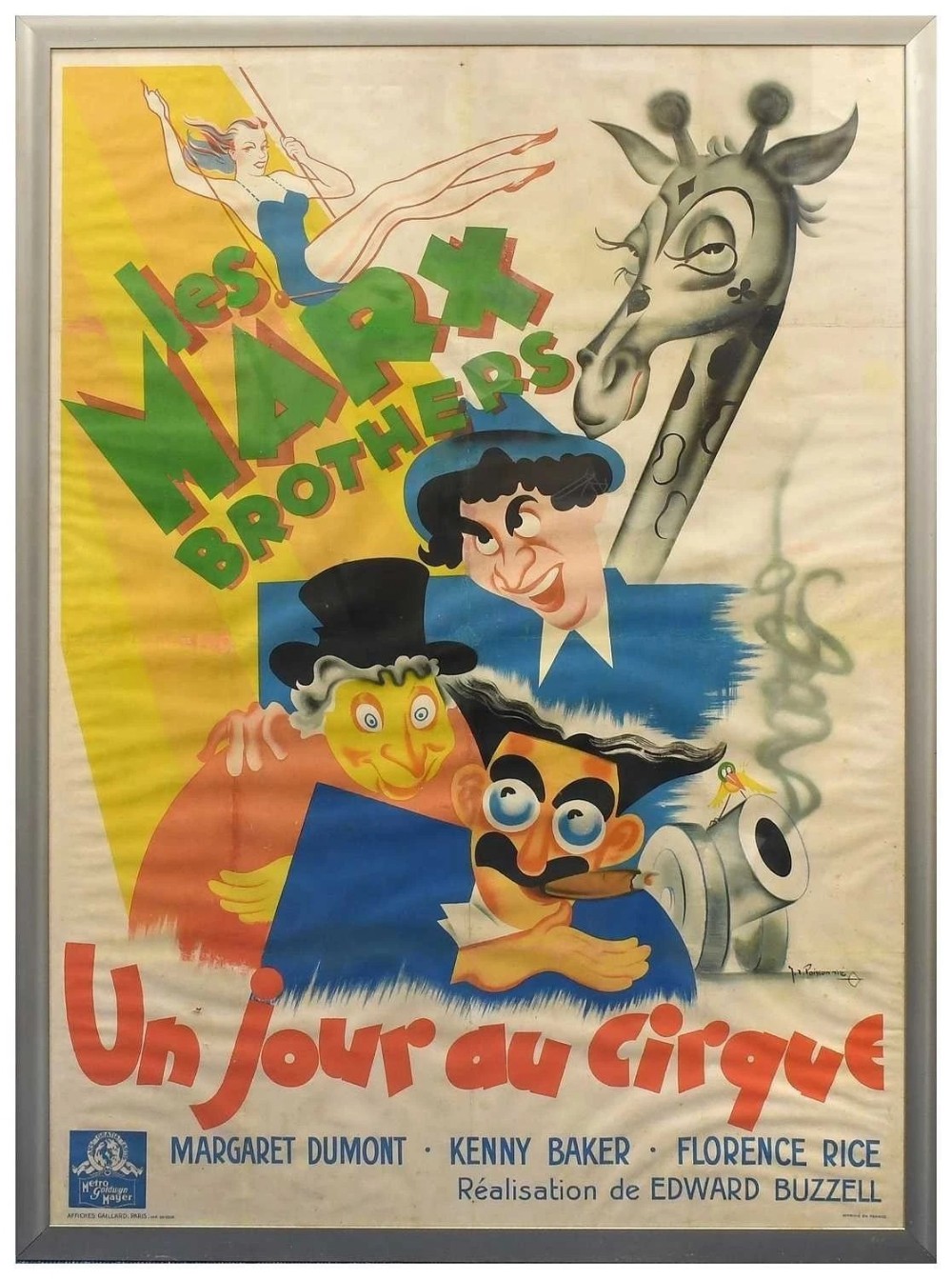 A large framed French film poster featuring colourful caricatures of the Marx Brothers, a giraffe, and circus performers in shades of yellow, blue, and red.