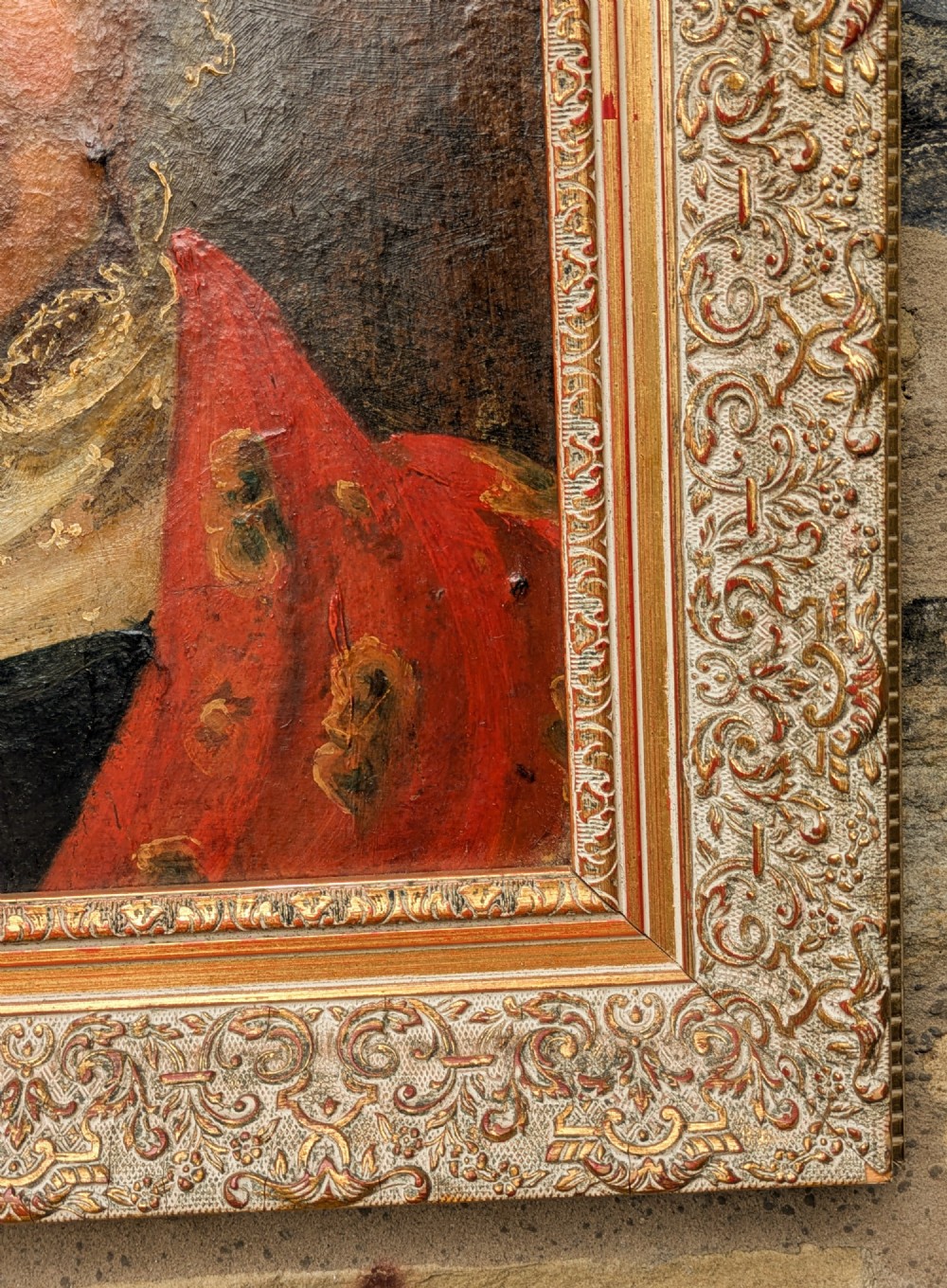An antique 19th-century oil portrait depicting an elderly woman in a lace cap and red patterned shawl, framed in a carved gilt wood frame. View VII
