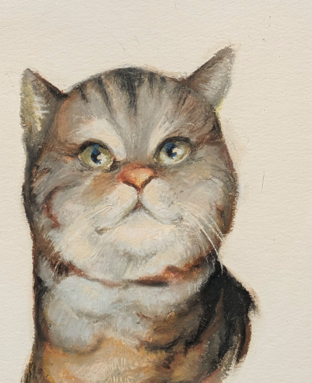 A framed pastel portrait depicting a grey and brown tabby cat set inside an ornate gold-coloured molded frame. View V