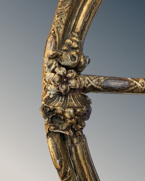 An ornate Rococo gilded wood wall bracket featuring mirrored back panels, serpentine frame, and decorative carved scrollwork. View V
