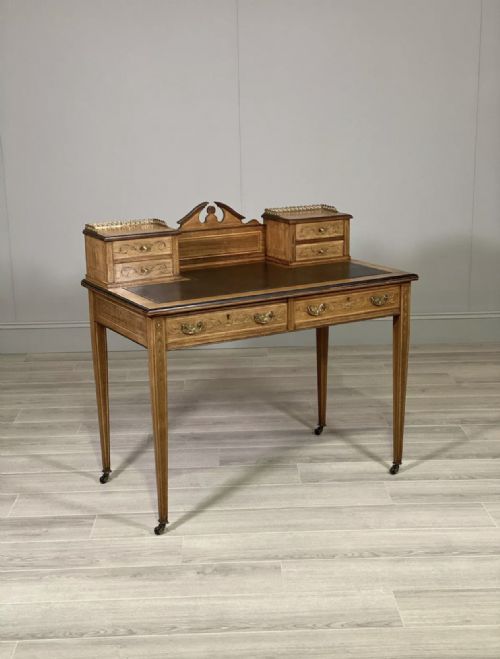 a victorian rosewood desk by maple co - CATEGORY: ANTIQUE BUREAU - DATED 19TH CENTURY
