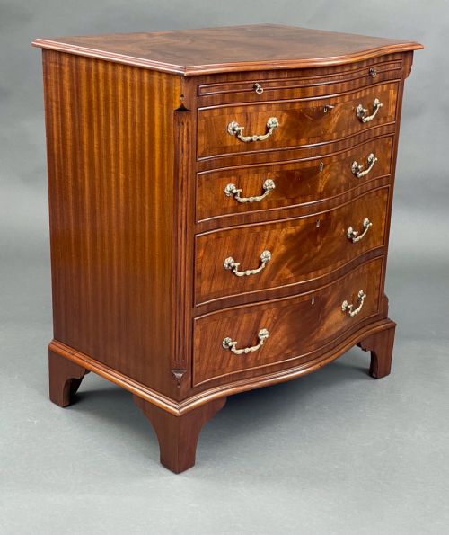 fig 1. Mahogany Georgian style serpentine chest of drawers