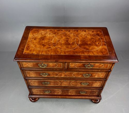 fig 1. 18th century walnut and yew oyster chest of drawers