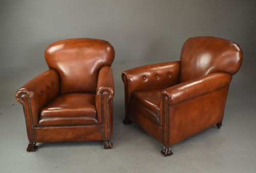 fig 2. Antique pair of leather club chairs