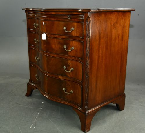 fig 1. 19th century small serpentine mahogany bachelors chest