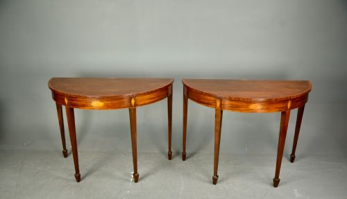 fig 1. Pair of 19th century mahogany Demi lune console tables