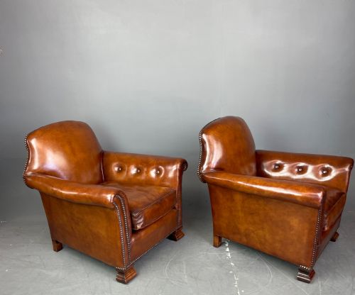 fig 1. pair of leather arm chairs circa 1900