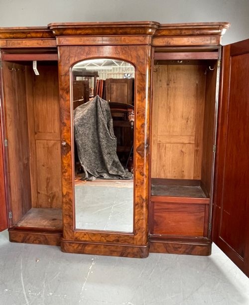 fig 1. Victorian burr walnut breakfront triple door wardrobe