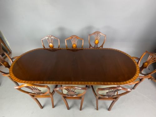 fig 1. Regency style dining table and eight chairs