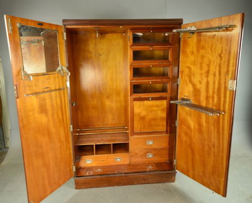 fig 1. Art Deco walnut compactom gentlemen's wardrobe by The Valet