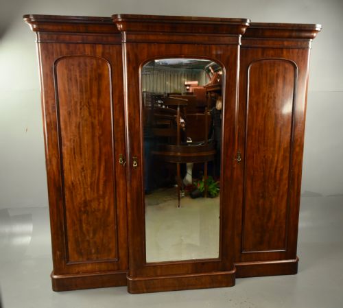 fig 1. Victorian mahogany breakfront triple wardrobe compactom
