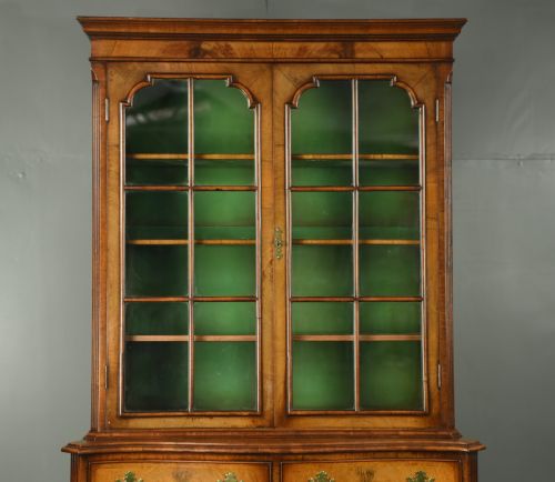 fig 1. Walnut Queen Anne style serpentine bookcase