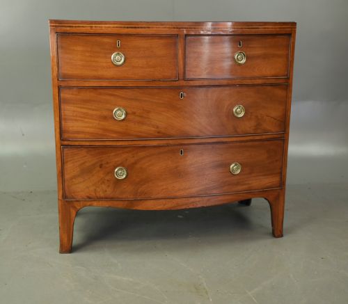 fig 1. Small Georgian mahogany bow front chest of drawers