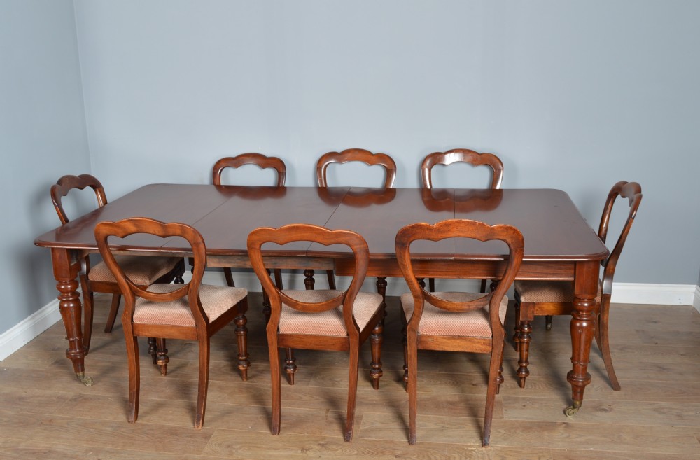 Early Victorian extending dining table and 8 victorian chairs 