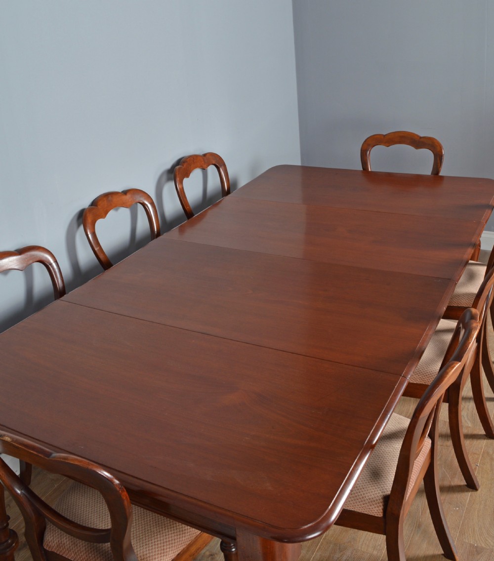 Early Victorian extending dining table and 8 victorian chairs  View II
