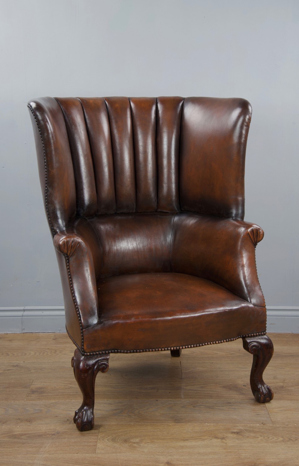 Antique 19th century leather barrel back porters wing chair 