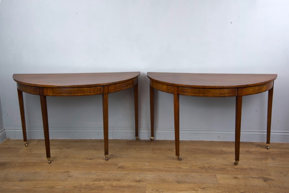 Pair of Antique Georgian mahogany Demi lune console tables 
