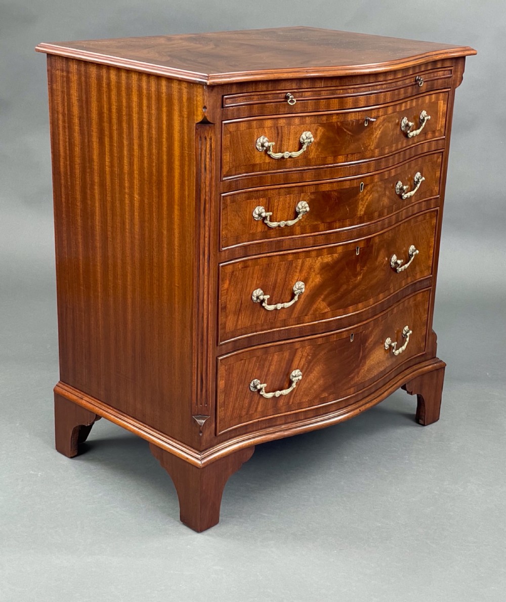 Mahogany Georgian style serpentine chest of drawers  View II