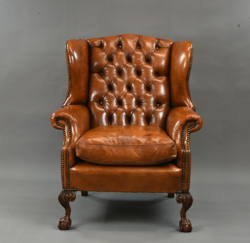 large Antique deep buttoned leather wing chair  View III