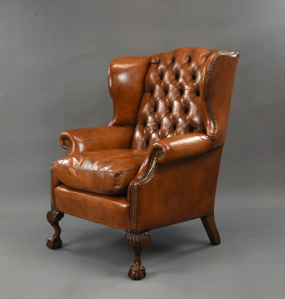 large Antique deep buttoned leather wing chair  View IV