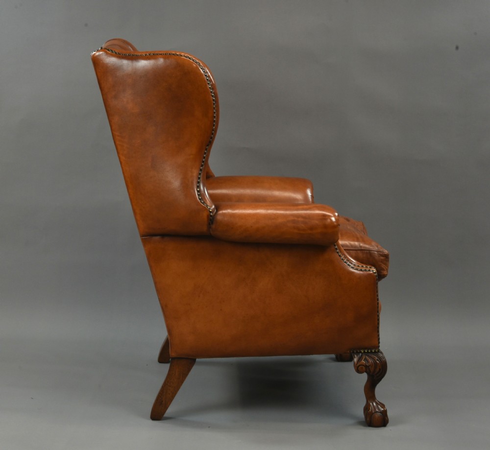 large Antique deep buttoned leather wing chair  View VI