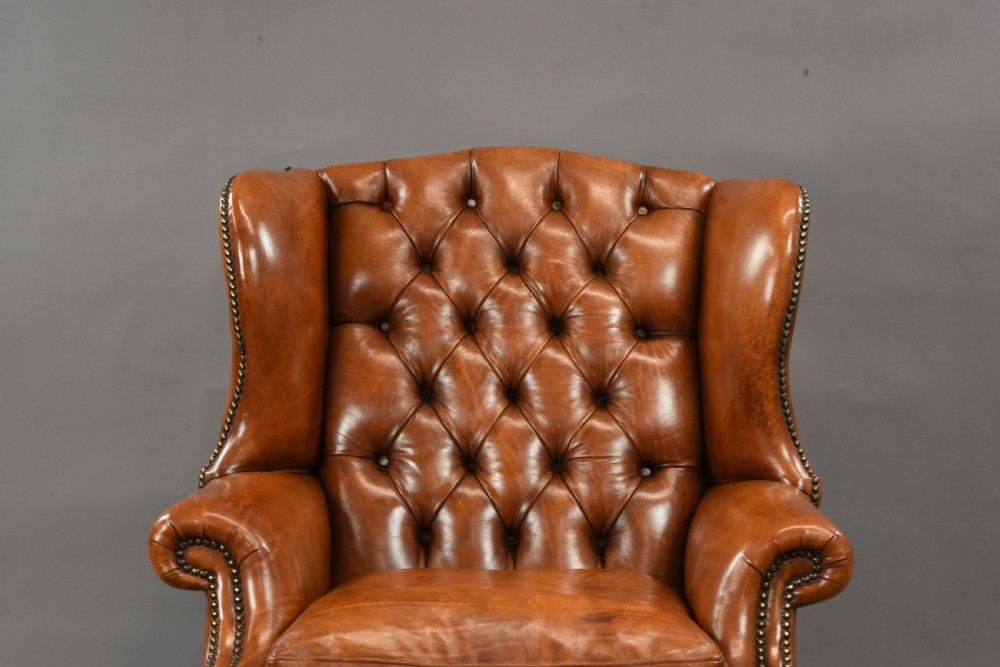 large Antique deep buttoned leather wing chair  View VII