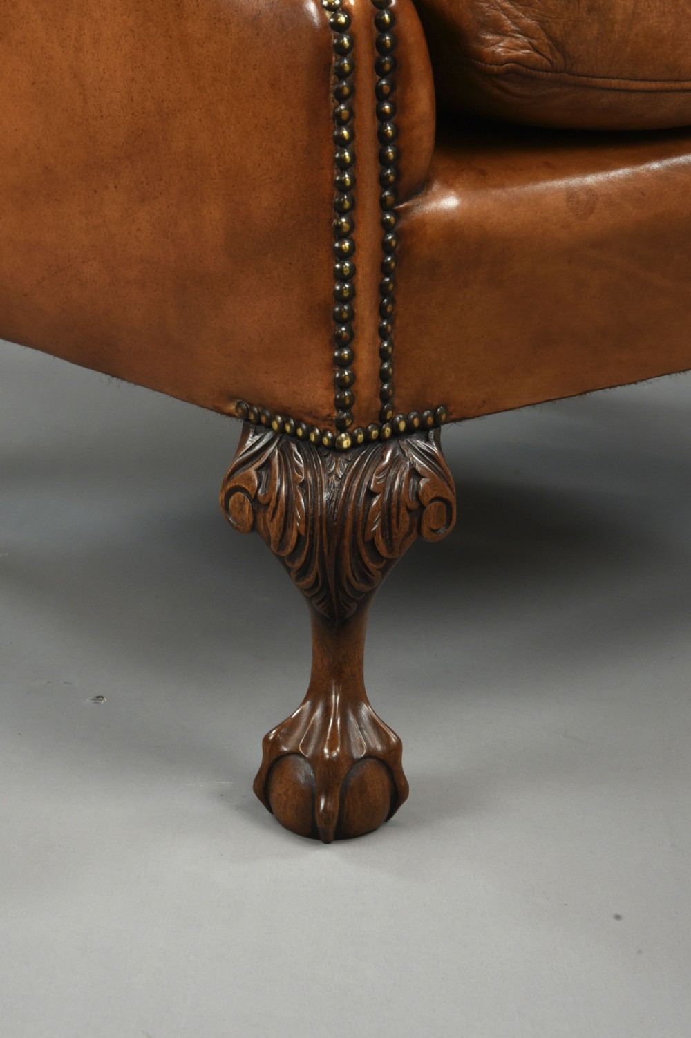 large Antique deep buttoned leather wing chair  View X