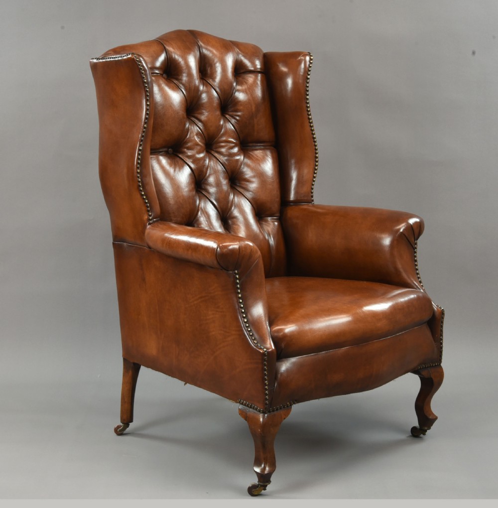 fine antique leather wing chair 