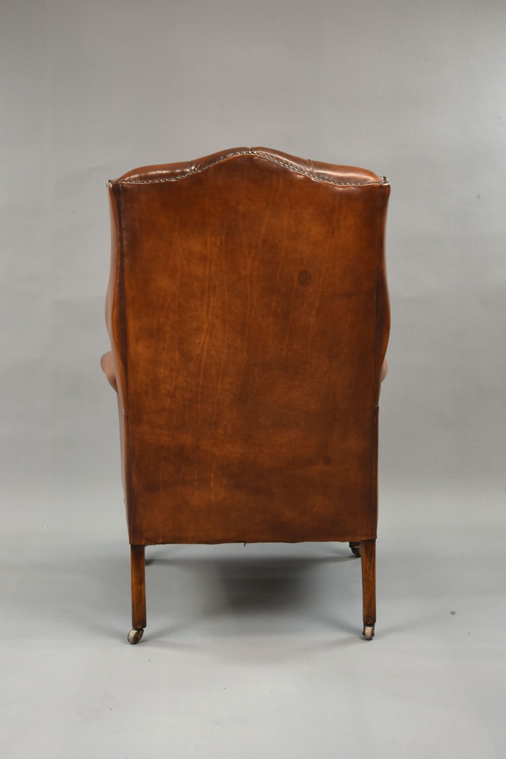 fine antique leather wing chair  View VI
