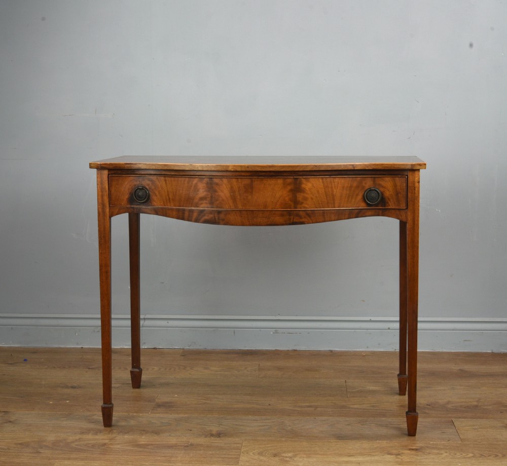19th century serpentine mahogany side hall table 