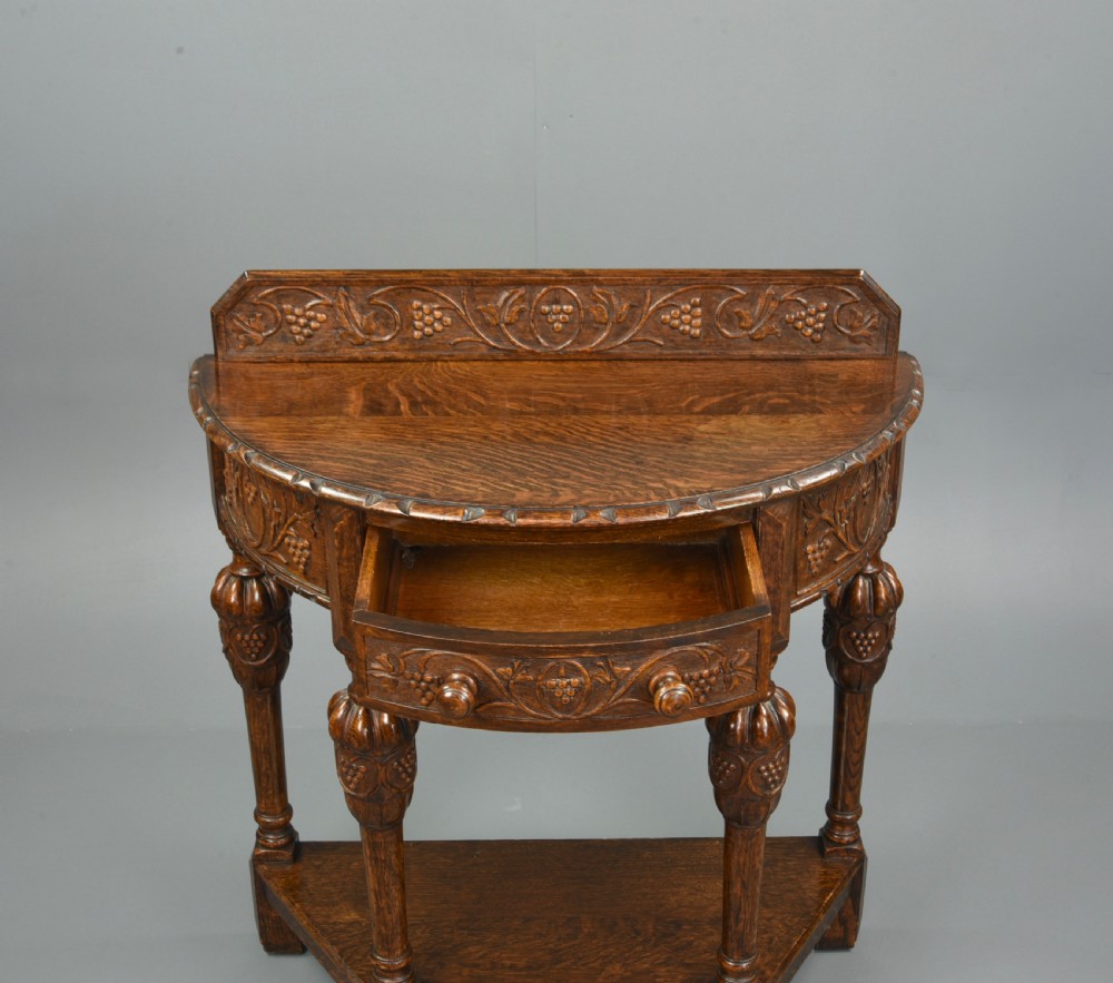 Carved oak demi lune hall side table  View IV