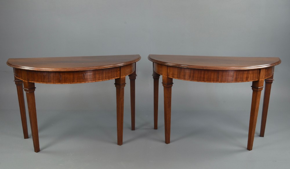 pair of 19th century mahogany Demi lune console tables 