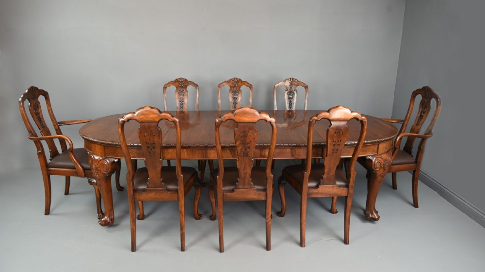 walnut dining table and eight chairs by S Hille & Co London 