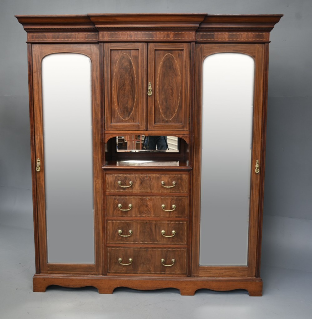 Mahogany triple wardrobe compactom by JAS Shoolbred & co 