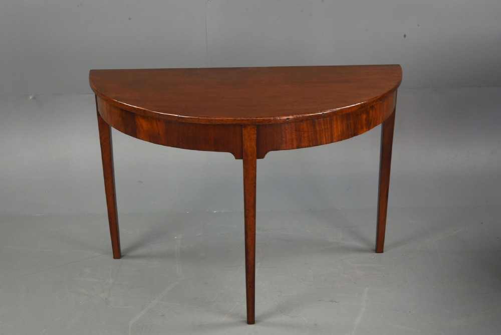 pair of Georgian mahogany demi lune console tables  View III