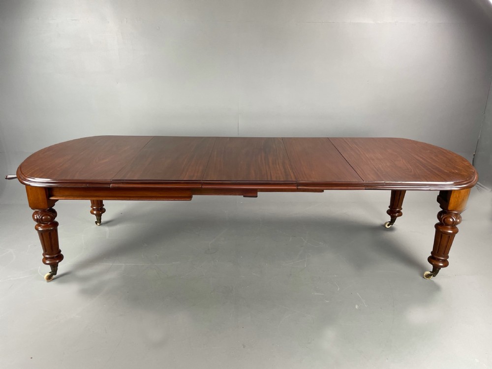 large Victorian mahogany extending dining table  View II