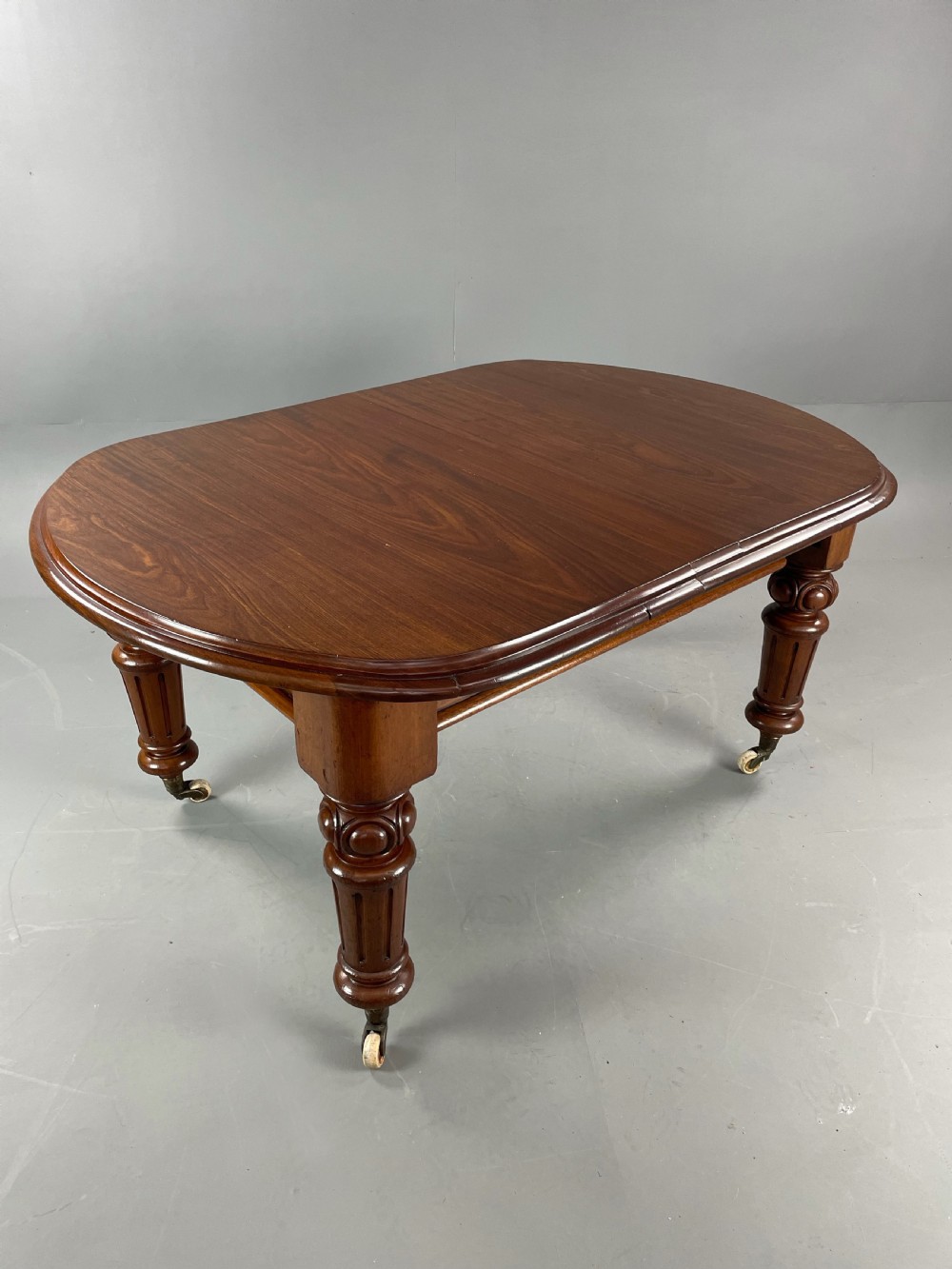 large Victorian mahogany extending dining table  View III