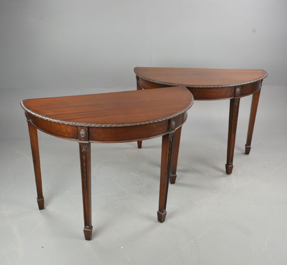 Pair of Adams style mahogany console tables 